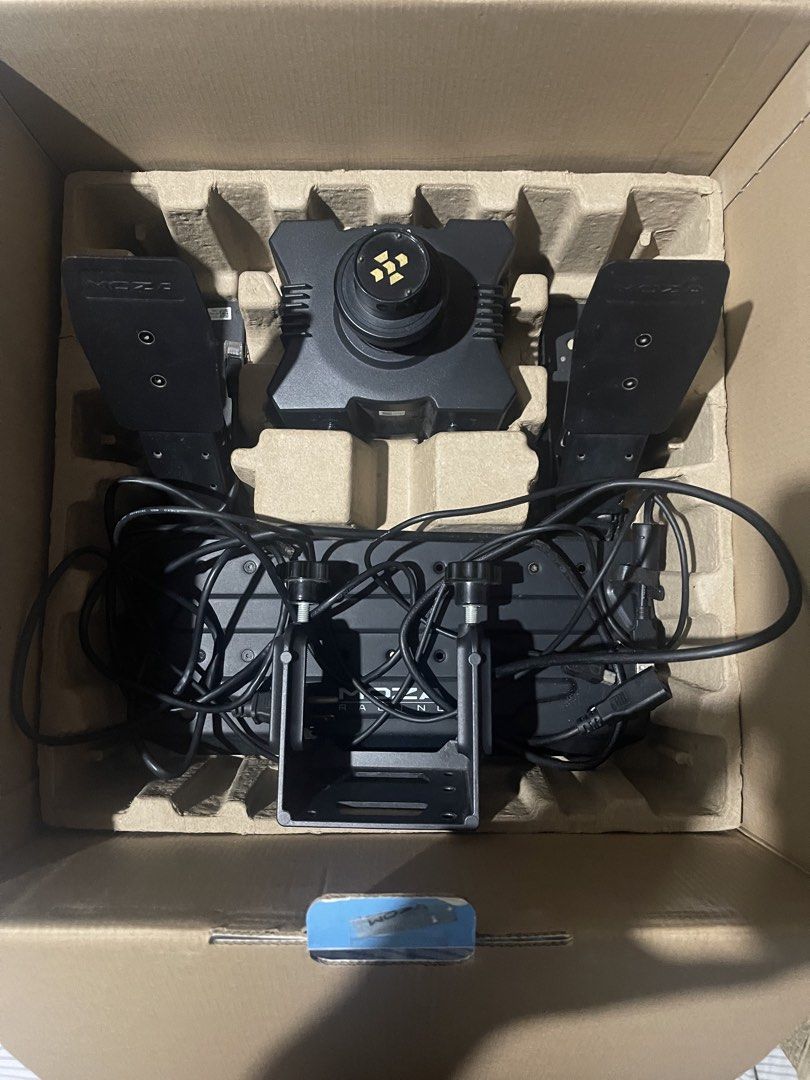 Moza R5 Bundle (Category: Controllers) located in Manila. Submitted by jamesmatt (Listing ID 1458104156, Image 3). Description: RUSH LFB Moza r5 bundle Includes ES steering wheel Pedals R5 wheelbase Table clamp Cables Negotiable Location: Iloilo.