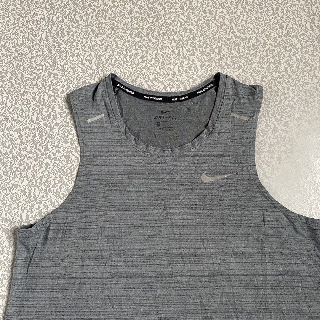 Nike Running Tank Top with Reflective Logo (Category: Activewear) located in Cabuyao City. Submitted by stuffwarsph (Listing ID 1458098156, Image 2). Description: Nike Running Tank Top with Reflective Logo Small on tag Width 18 Length 24.5 Good as new 10/10 Color rate No issues ₱400.