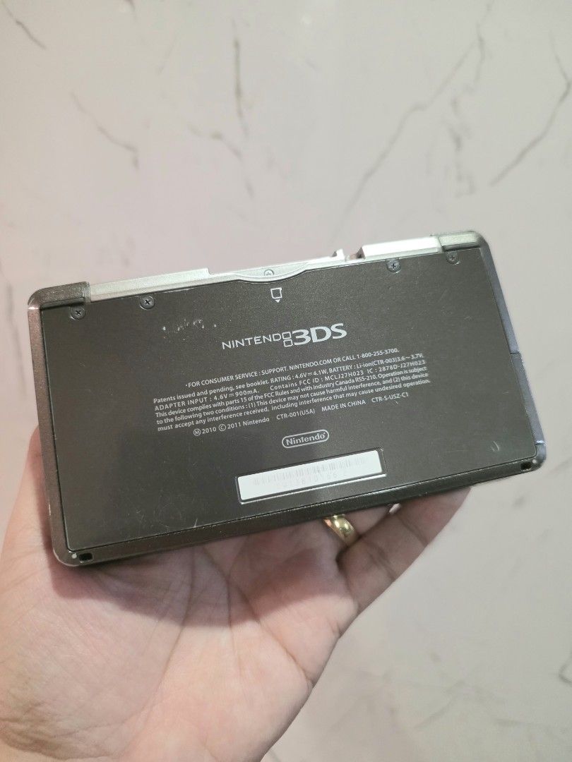 Nintendo 3DS Cosmo Black US Version Non-CFW (Category: Nintendo) located in Mandaluyong City. Submitted by chan.ningtatum (Listing ID 1426445095, Image 2). Description: For Sale! Nintendo 3DS Cosmo Black US Version ! Non-CFW ! Good Working Condition. Tested Working Checkouts via Shope e and Laz ada Available Shipping: Lalamove, Grab Meet ups: Mandaluyong City or San Juan City.