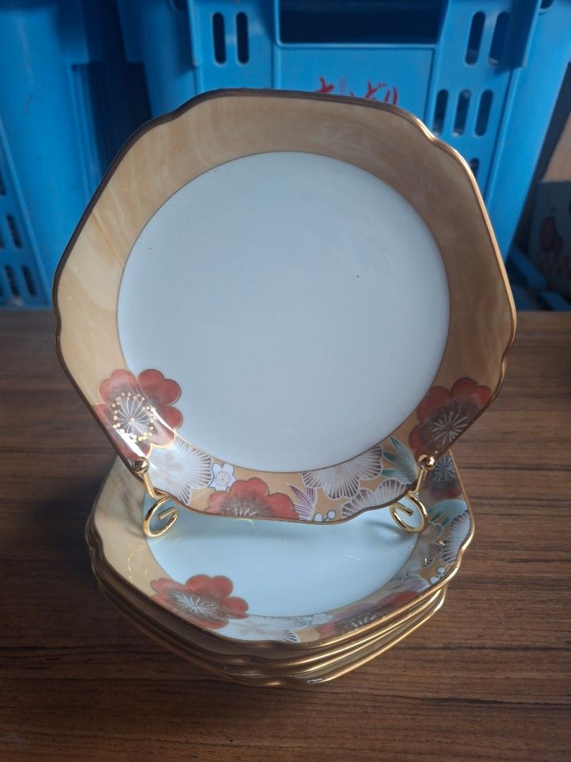 Noritake Harutonari Side Plate Set of 5 (Category: Dinnerware & Cutlery) located in Consolacion. Submitted by luxekerei (Listing ID 1458184952, Image 1). Description: - Noritake "Harutonari" 15cm side plates featuring a scalloped rim, gold trim, and red-and-gold floral pattern.