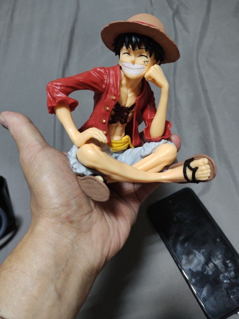 One Piece Monkey D. Luffy Action Figure (Category: Figurines & Statues) located in Manila. Submitted by dongdongv (Listing ID 1458129074, Image 2). Description: - Collectible Monkey D. Luffy action figure - Features iconic red shirt and straw hat - Highly detailed design capturing his adventurous spirit - Perfect display piece for any anime fan or collector - Fun addition to any collection.