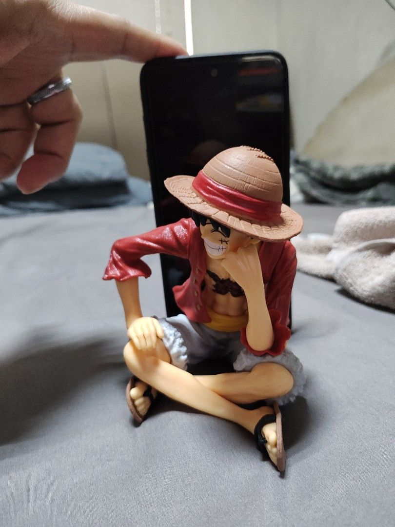 One Piece Monkey D. Luffy Action Figure (Category: Figurines & Statues) located in Manila. Submitted by dongdongv (Listing ID 1458129074, Image 1). Description: - Collectible Monkey D. Luffy action figure - Features iconic red shirt and straw hat - Highly detailed design capturing his adventurous spirit - Perfect display piece for any anime fan or collector - Fun addition to any collection.