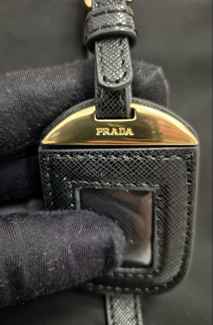 Onhand! Prada Large Two Way Tessuto Bag (Category: Luxury Bags & Wallets) located in Manila. Submitted by mrsmdxbseller (Listing ID 1458105659, Image 2). Description: Authentic Brand New Comes complete Message me for additional photos Price slightly negotiable.