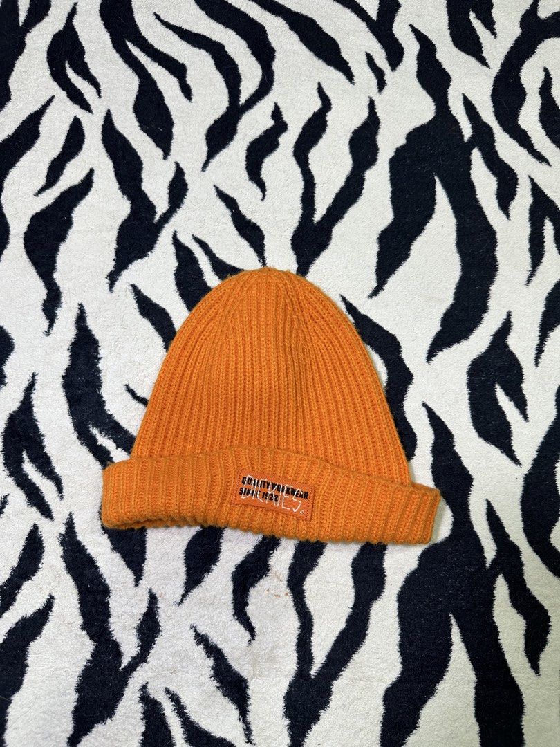 Orange Beanie with Embroidered Logo (Category: Hats & Beanies) located in Butuan. Submitted by atcabertojr (Listing ID 1458102462, Image 1). Description: - Orange ribbed beanie - Features a small embroidered logo patch on the front cuff - Standard beanie size, fits most - Ideal for keeping warm - Simple and classic design.