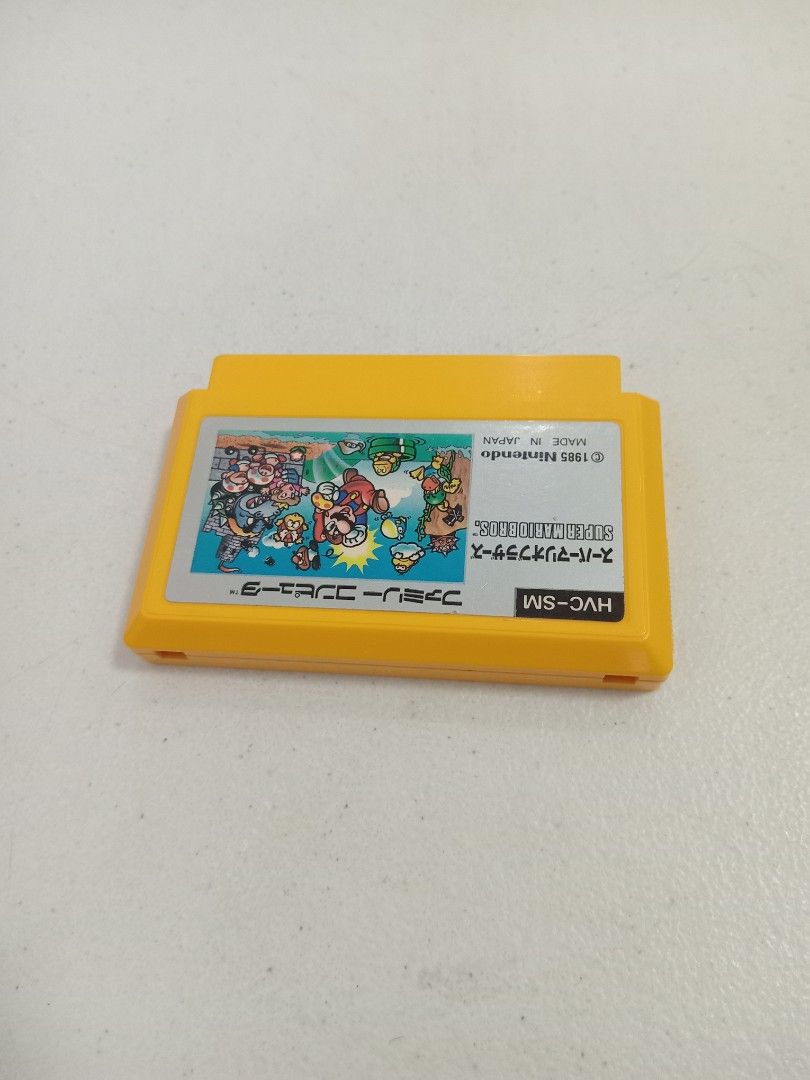 Original Super Mario Bros. Famicom Game (Category: Nintendo) located in Manila. Submitted by joel.gulmatico (Listing ID 1458186810, Image 3). Description: - Original Super Mario Bros. game for Famicom - Made in Japan - Original yellow cartridge with label - Fun for Nintendo fans - A piece of gaming history!.