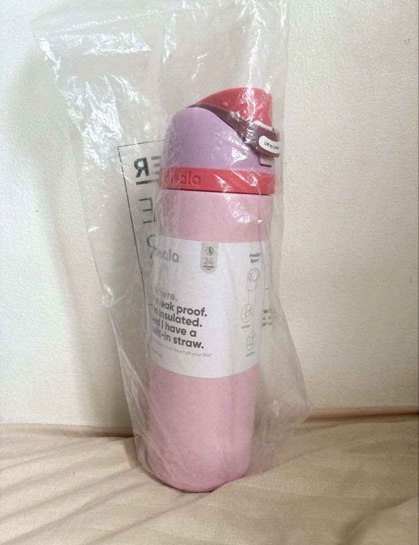 Owala Pink Water Bottle 24oz (Category: Water Bottles & Tumblers) located in Manila. Submitted by sunnysidetrades (Listing ID 1457328599, Image 1). Description: - Cute pink Owala water bottle - Unique flip-top lid for easy access - Convenient carrying loop for portability - 'Owala' branding visible on bottle and lid - Ideal for staying hydrated anywhere.