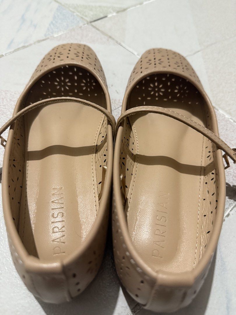 PARISIAN Beige ballet shoes (Category: Flats & Sandals) located in Manila. Submitted by kcrapsing (Listing ID 1458210669, Image 2). Description: 1 day old. Very very lightly used. - Beige flats with a charming floral cut-out pattern. - Features a strap across the top with an adjustable buckle closure. - Brand name "PARISIAN" stamped on the insole. - Comfortable and stylish for daily wear. - Easy to slip on and off for convenience..