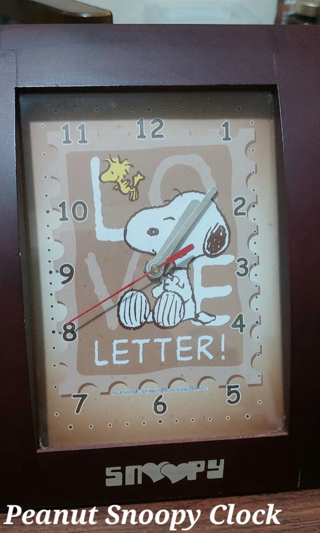 Peanut Snoopy Wooden Wall Clock (Category: Clocks) located in Calamba. Submitted by myhomeshop_ph (Listing ID 1458252829, Image 2). Description: Peanuts Snoopy and Woodstock "Love Letter!" wooden wall clock. Built with a rectangular dark brown wooden frame. Analog quartz , battery operated. Calamba Laguna.