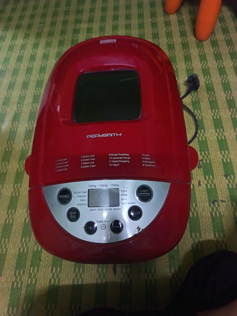 PERYSMITH Red Bread Maker Machine (Category: Breadmakers) located in Kota Tinggi. Submitted by hoodiepop (Listing ID 1458224941, Image 1). Description: - Red PERYSMITH bread maker - Multiple settings for various bread types and dough - Loaf sizes: 1000g, 1250g, 1500g - Functions: Delay timer, knead, rise, bake, keep warm - Easy-to-use control panel with digital display - Perfect for homemade bread enthusiasts prize can nego.