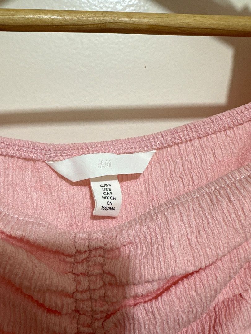 Pink Square Neck Ruched Peplum Top (Category: Sleeveless) located in Mandaluyong City. Submitted by lovedbyjaaaam (Listing ID 1458167823, Image 2). Description: - Cute pink top - Square neckline - Ruched front detail - Flattering peplum hem - Puffed sleeves - Textured fabric - Versatile: pairs well with jeans or skirts.