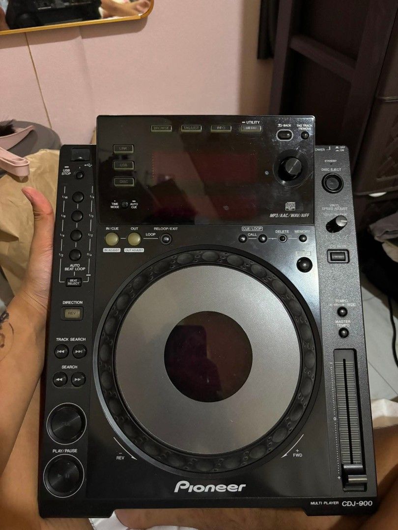 Pioneer CDJ-900 Multi Player DJ CD Deck (Category: Other Audio Equipment) located in Manila. Submitted by leosibalon50828 (Listing ID 1458232449, Image 1). Description: - Pioneer CDJ-800 Multi-Player CD Deck - Ideal for DJs, perfect for mixing and performing sets - Features a jog wheel for scratching and cueing - Includes essential controls: Play, Pause, Cue, Track Search - Built-in loop functions for creative mixing - Tested and confirmed to be 
