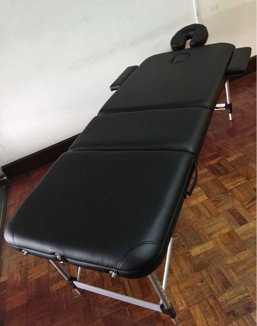 Portable Massage Bed / Table (Category: Massage Devices) located in Makati City. Submitted by bebopthelula (Listing ID 1458182567, Image 1). Description: High quality massage bed / table with detachable head and arm rests RFS: not in use.