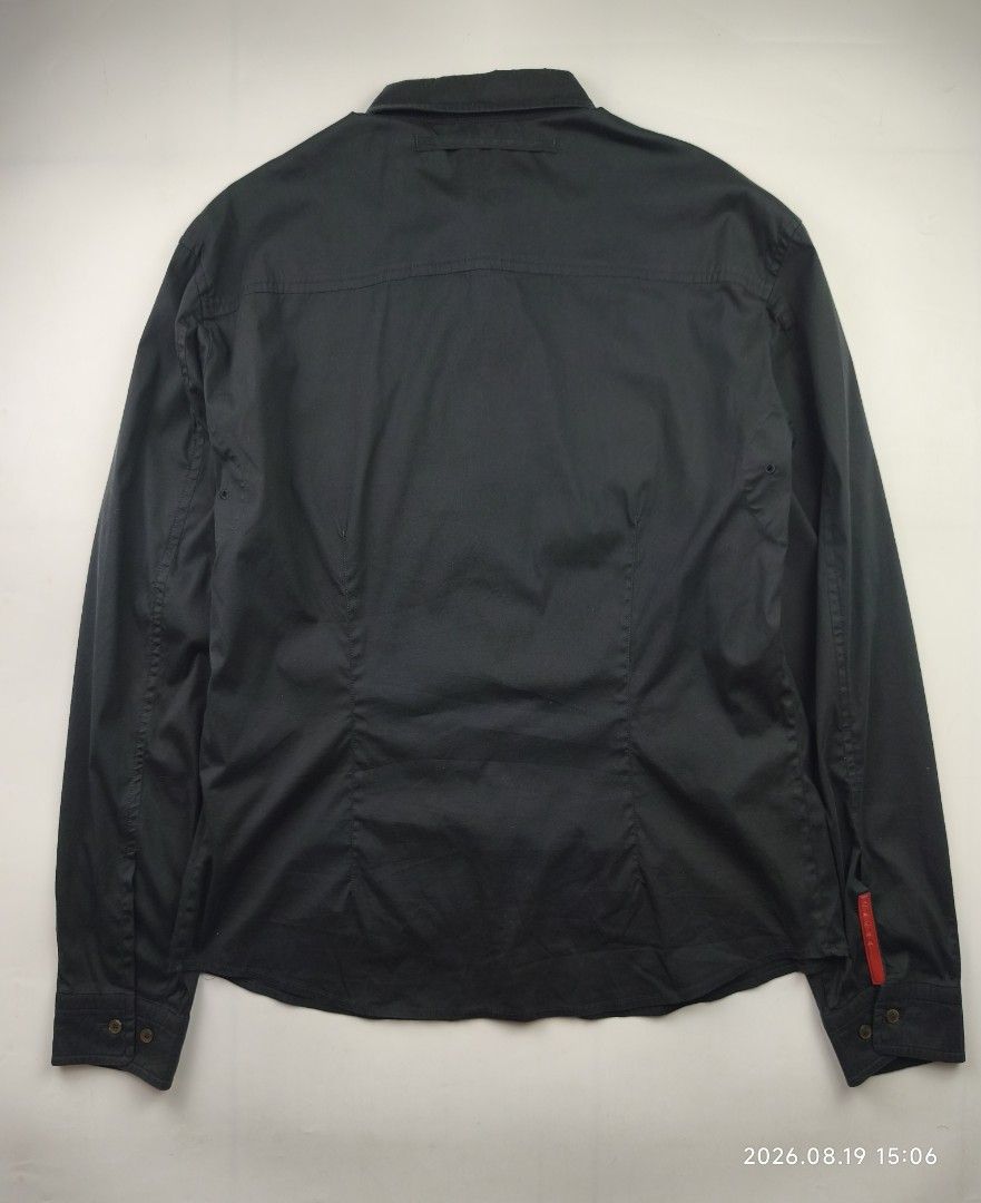 Prada 00's buttondown longsleeve shirt (Category: Formal Shirts) located in Manila. Submitted by corner_finds (Listing ID 1458164242, Image 2). Description: size XL on tag pit to pit 22.4' length 28.7' shoulders 20.4' sleeve length 26.7' no major flaw no discoloration still in great condition 4499+sf dm.
