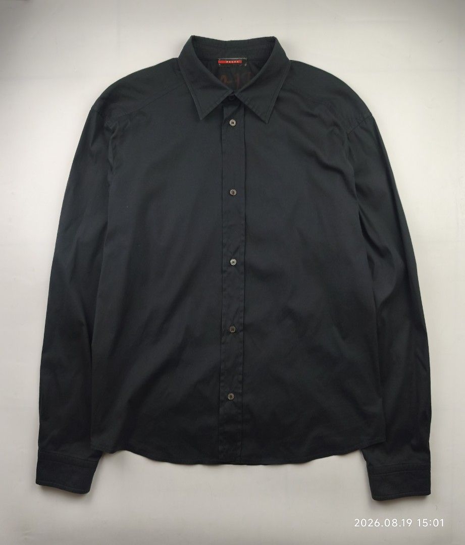Prada 00's buttondown longsleeve shirt (Category: Formal Shirts) located in Manila. Submitted by corner_finds (Listing ID 1458164242, Image 1). Description: size XL on tag pit to pit 22.4' length 28.7' shoulders 20.4' sleeve length 26.7' no major flaw no discoloration still in great condition 4499+sf dm.