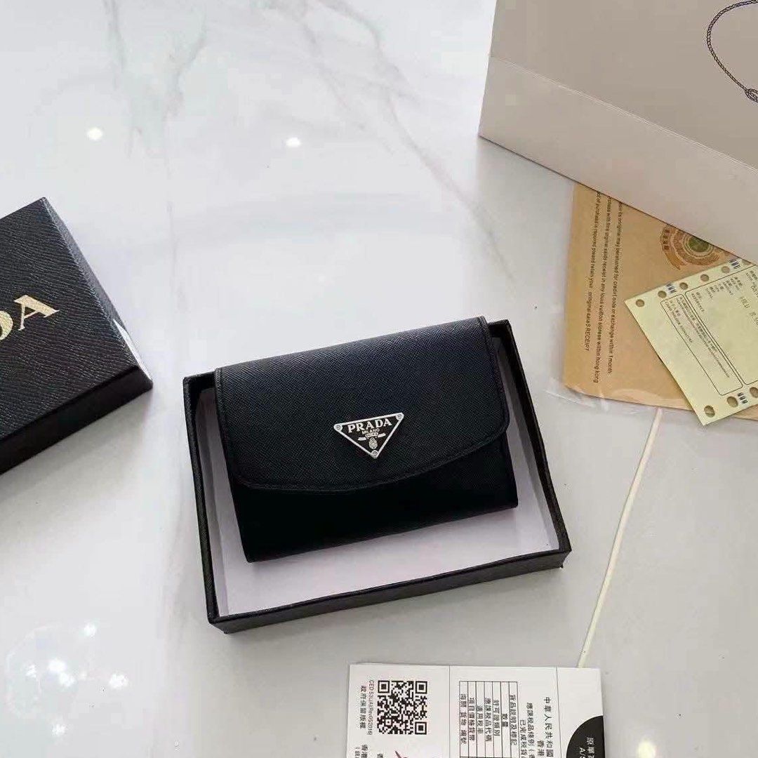 Prada Saffiano Leather Tri-Fold Wallet Black (Category: Luxury Bags & Wallets) located in Manila. Submitted by mimi4373 (Listing ID 1458114335, Image 3). Description: Prada Wallet - Includes original box and authenticity cards Perfect for gift giving..
