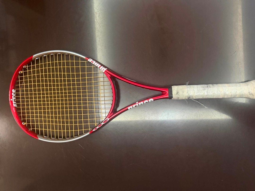 Prince Tennis Racquet - Red (Category: Racket and Ball Sports) located in Cavite. Submitted by grecegalang (Listing ID 1458228908, Image 3). Description: Prince 003 weight 290 head size 100 almost new yan with new grip tape na.