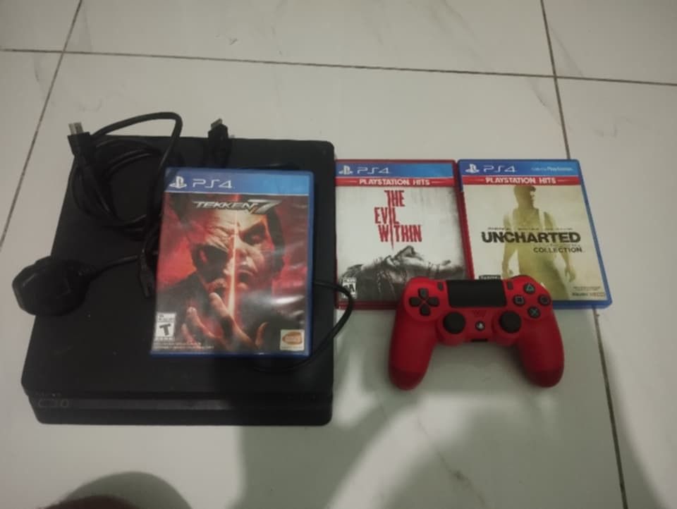 PS4 Console with Tekken 7, The Evil Within, Uncharted Collection (Category: PlayStation) located in Paranaque City. Submitted by jovynation (Listing ID 1458297575, Image 1). Description: - PlayStation 4 Console - Games: Tekken 7, The Evil Within, Uncharted Collection - Controller: Red DualShock 4 - Includes all necessary cables - Ready for immediate gaming.
