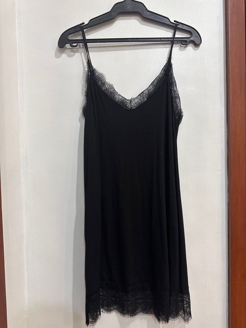 Pull & Bear Black Lace Trim Slip Dress Size S (Category: Dresses) located in Quezon City. Submitted by decluttering_alot (Listing ID 1458112508, Image 1). Description: - Black slip dress from Pull & Bear - Features delicate lace trim on neckline and hem - Adjustable spaghetti straps Size: Small RFS: closet cleanup Brand new and never worn!.