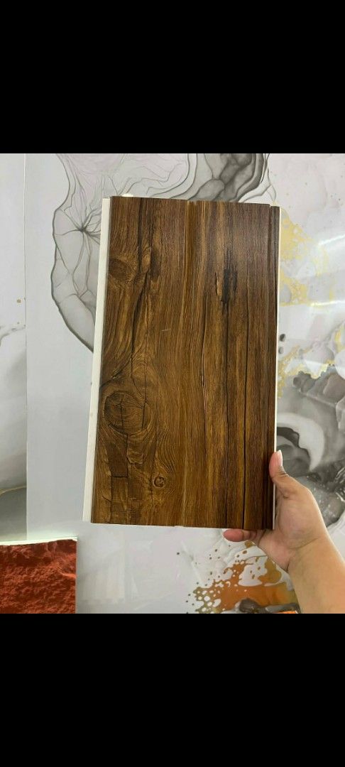PVC Wood Grain Wall Panels - Various Designs (Category: Wall Decor) located in Manila. Submitted by txsgvince17 (Listing ID 1458152798, Image 1). Description: - Elevate your home decor with Lxz ceiling panels. - Available in two elegant finishes: Dark Brown and Light White. - Perfect for covering your desired area. - Ideal for interior decoration projects. - Simple and easy to install, making DIY a breeze. .