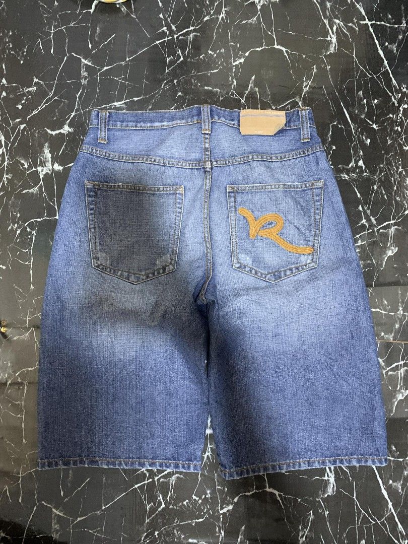 Rocawear Denim Shorts (Category: Announcements) located in Manila. Submitted by raschidnic68861 (Listing ID 1458251720, Image 3). Description: - Brand: Rocawear - Item: Denim Shorts - Color: Classic Blue Wash - Size: 30 on tag fit to 32 length: 26 thigh: 14 hem: 12 - Features: Iconic 'R' logo on back pocket - Style: Perfect for casual wear - Condition: Please check photos for detailed condition.