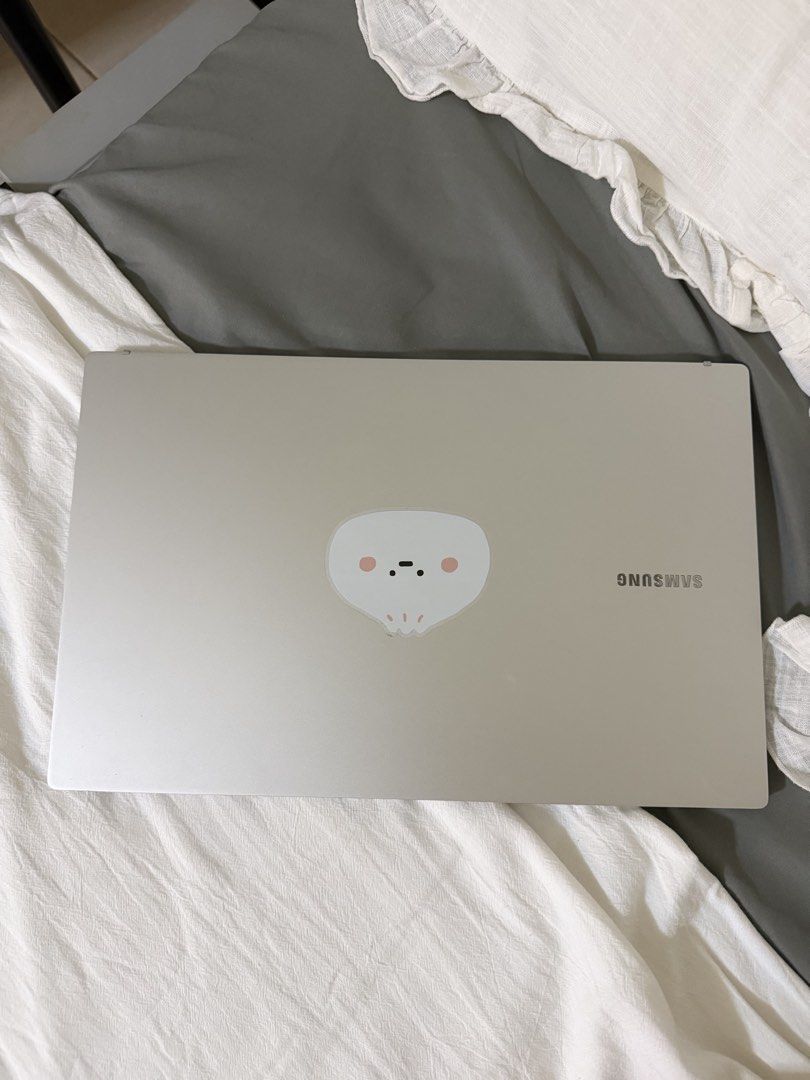 Samsung Laptop Silver with Cute Stickers (Category: Laptops & Notebooks) located in Taguig. Submitted by znana997 (Listing ID 1458213598, Image 1). Description: - Silver Samsung Book 4 Laptop - Bilingual keyboard (English & Korean characters) - Ideal for remote works - Comes with Windows 10 installed - With charger - No Box since bought from Korea more than 2 years ago.