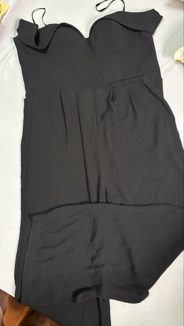 SHEIKE Black Off-Shoulder Jumpsuit Size 14 (Category: Jumpsuits) located in Cavite. Submitted by cariaqui0422 (Listing ID 1458141149, Image 1). Description: - SHEIKE black off-shoulder jumpsuit - Size 14 - Features a sweetheart neckline - Wide-leg pants - Pleats at the waist - Ideal for night outs or formal events - Please check photos for any minor marks.