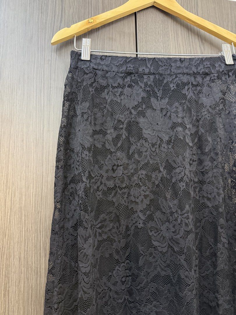SHEIN Black Lace Maxi Skirt (Category: Skirts) located in Antipolo. Submitted by kathscloset_ (Listing ID 1458229380, Image 2). Description: - Full length black lace skirt - Delicate floral lace pattern - Comfortable elastic waistband - Versatile: dress up or down, layer or wear solo.