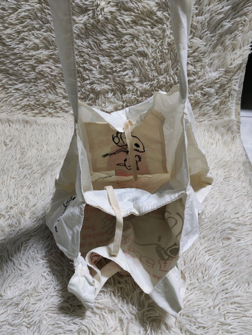 Snoopy WW1 Flying Age Canvas Tote Bag (Category: Tote Bags) located in Lucena. Submitted by cha_riz010726 (Listing ID 1458216668, Image 3). Description: - Adorable Snoopy tote bag with a fun WWI flying theme. - Features Snoopy dressed as a pilot. - Includes an interior pocket for organization. - Perfect for carrying your daily essentials. - Shows some signs of use, but remains in good, usable condition..