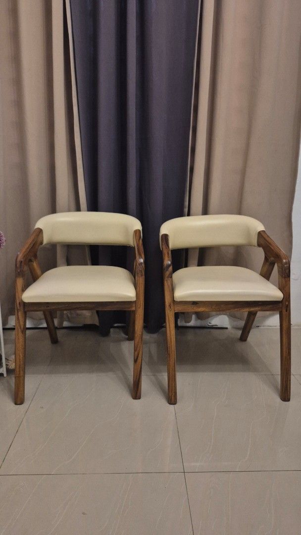 Solid Wood Dining Chairs (Category: Chairs) located in Bacoor. Submitted by jaizalouriz (Listing ID 1458149765, Image 2). Description: selling our dining chairs. aesthetic solid wood - mabigat po ito price per piece po is 4800. even in malls mahal po dining chairs nila, not wood pa po yun. willing to negotiate but wag po lowball masyado, I love these chairs but can't bring to our condo. Loc: Bacoor .