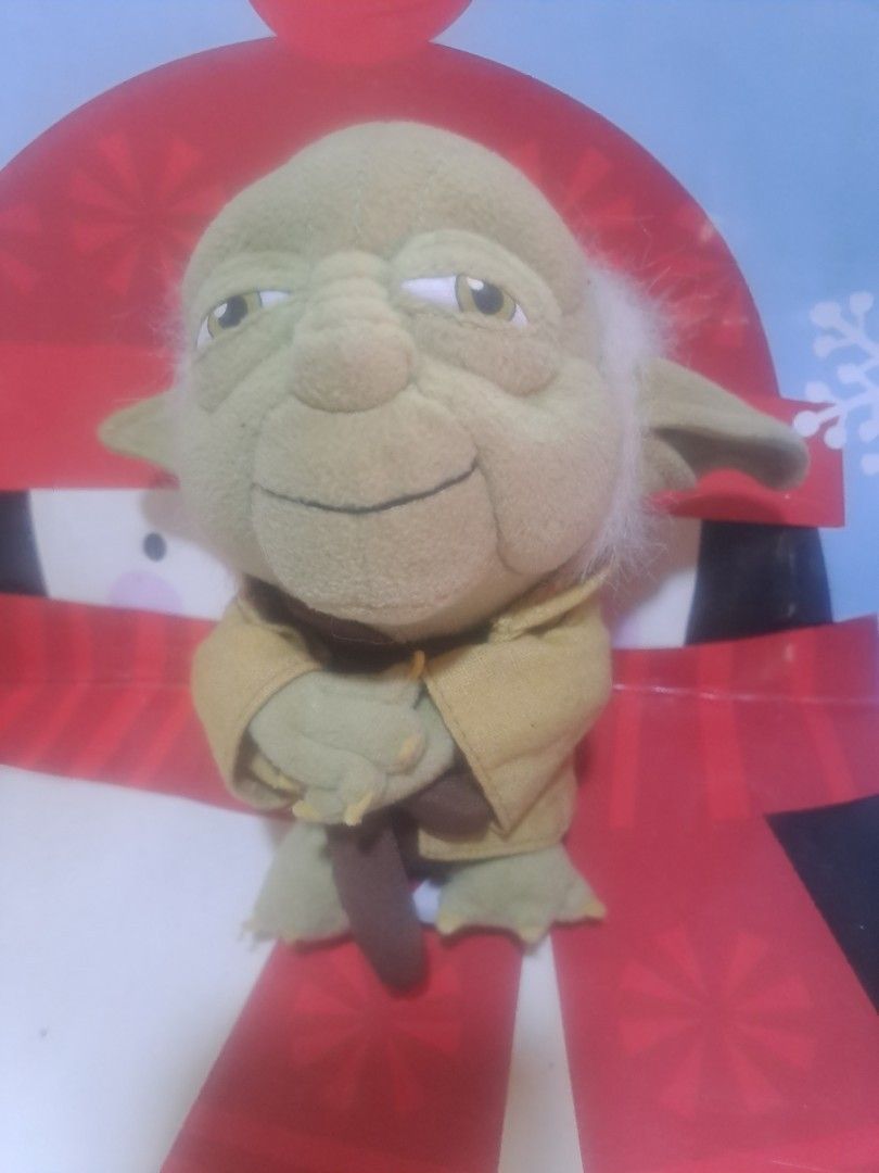Star Wars Yoda Plush Toy (Category: Plushies & Soft Toys) located in Davao. Submitted by bravemoon_556cd5 (Listing ID 1458192777, Image 1). Description: - Adorable Yoda plush toy from Star Wars. - Made with soft and cuddly material. - Features the official Star Wars tag on the back. - Ideal for any Star Wars enthusiast. - Great for both display and playtime..