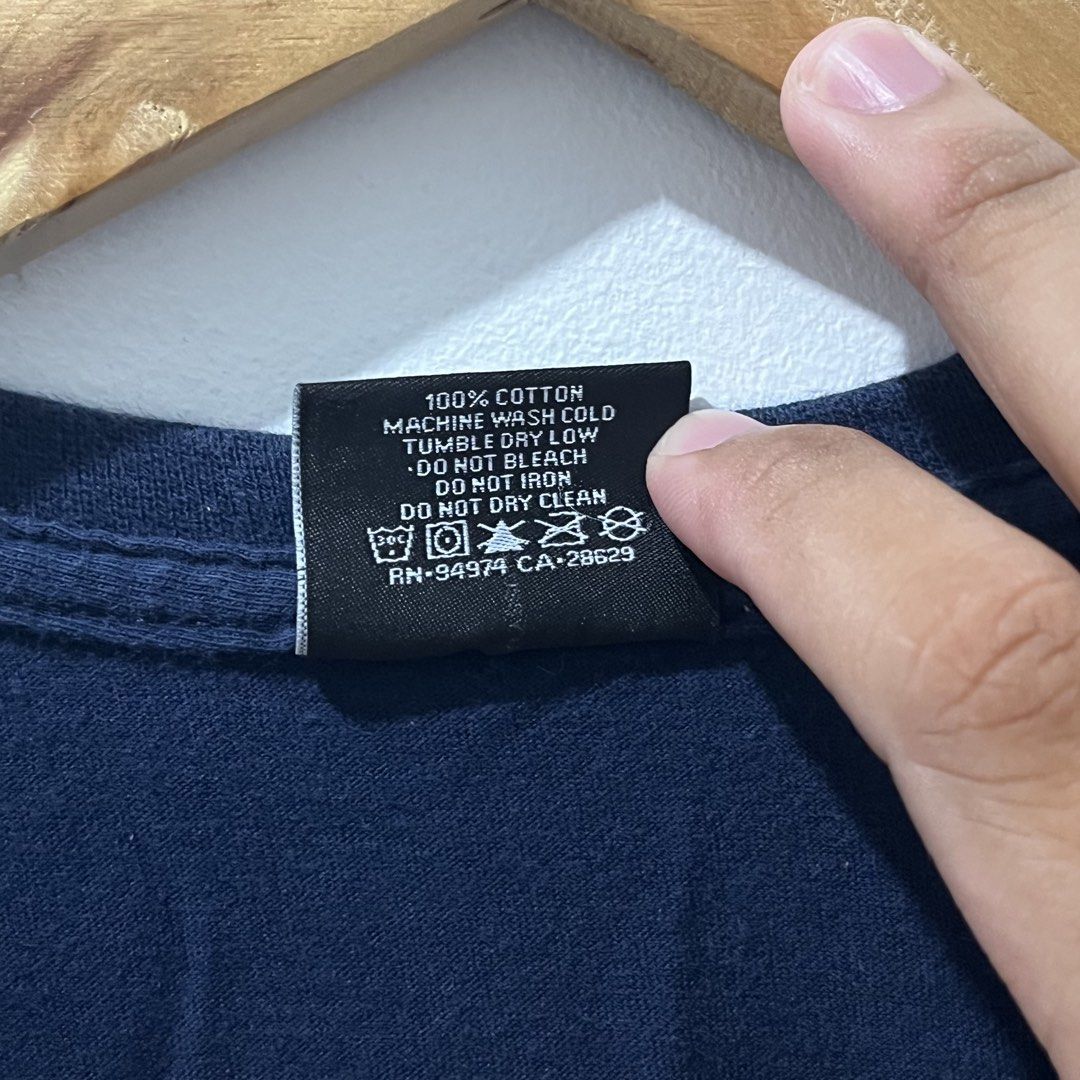 Stüssy Basic Logo Tee in a navy blue colorway (Category: Activewear) located in Manila. Submitted by lalakengmaypangarap (Listing ID 1458141554, Image 3). Description: LENGTH - 27.5" WIDTH - 17.5" PM.