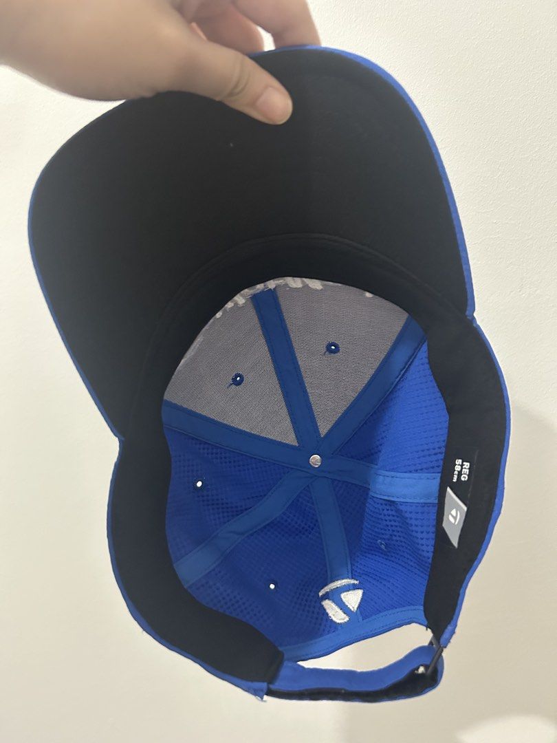 TaylorMade Blue Golf Cap (Category: Caps & Hats) located in San Juan City. Submitted by larzafrica (Listing ID 1458160531, Image 3). Description: - Blue TaylorMade golf cap - Embroidered TaylorMade logo on front - Adjustable strap for a comfortable fit - Size: 56cm - Ideal for sunny days on the golf course.