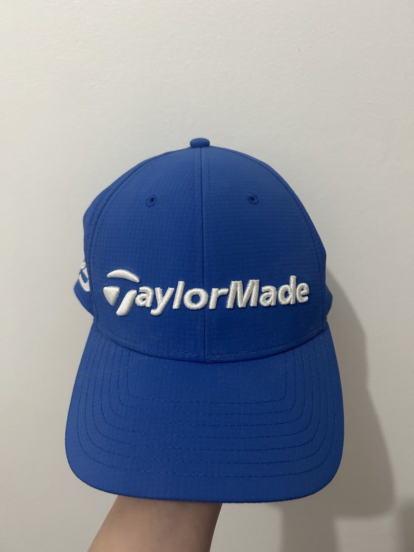 TaylorMade Blue Golf Cap (Category: Caps & Hats) located in San Juan City. Submitted by larzafrica (Listing ID 1458160531, Image 1). Description: - Blue TaylorMade golf cap - Embroidered TaylorMade logo on front - Adjustable strap for a comfortable fit - Size: 56cm - Ideal for sunny days on the golf course.