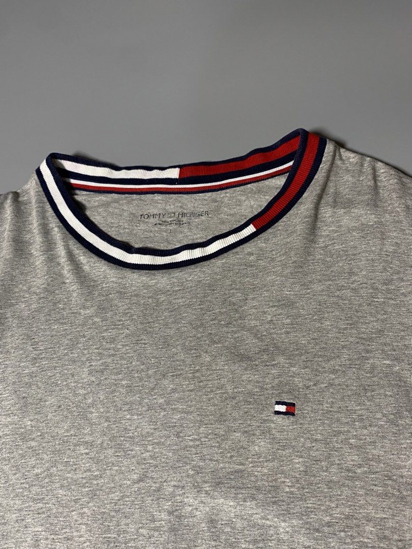 Tommy Hilfiger Crew Neck Shirt (Category: Tshirts & Polo Shirts ) located in Makati City. Submitted by earnx_ (Listing ID 1458253498, Image 2). Description: Tommy Hilfiger Crew Neck Shirt - Size large on tag - Dimension is 20x27 - Issue barely noticeable pink stain (light only) - Good Condition/For PSG purpose - I put that issue as being honest with the buyers .