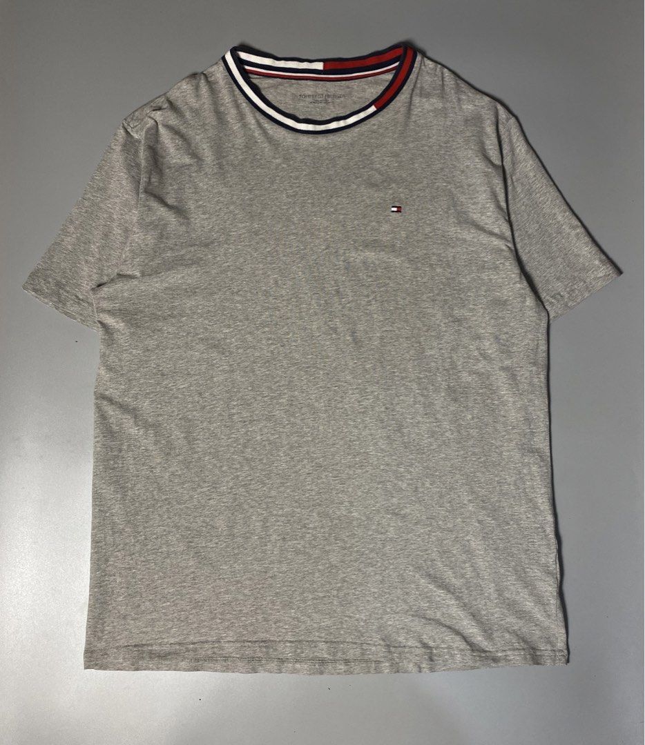 Tommy Hilfiger Crew Neck Shirt (Category: Tshirts & Polo Shirts ) located in Makati City. Submitted by earnx_ (Listing ID 1458253498, Image 1). Description: Tommy Hilfiger Crew Neck Shirt - Size large on tag - Dimension is 20x27 - Issue barely noticeable pink stain (light only) - Good Condition/For PSG purpose - I put that issue as being honest with the buyers .