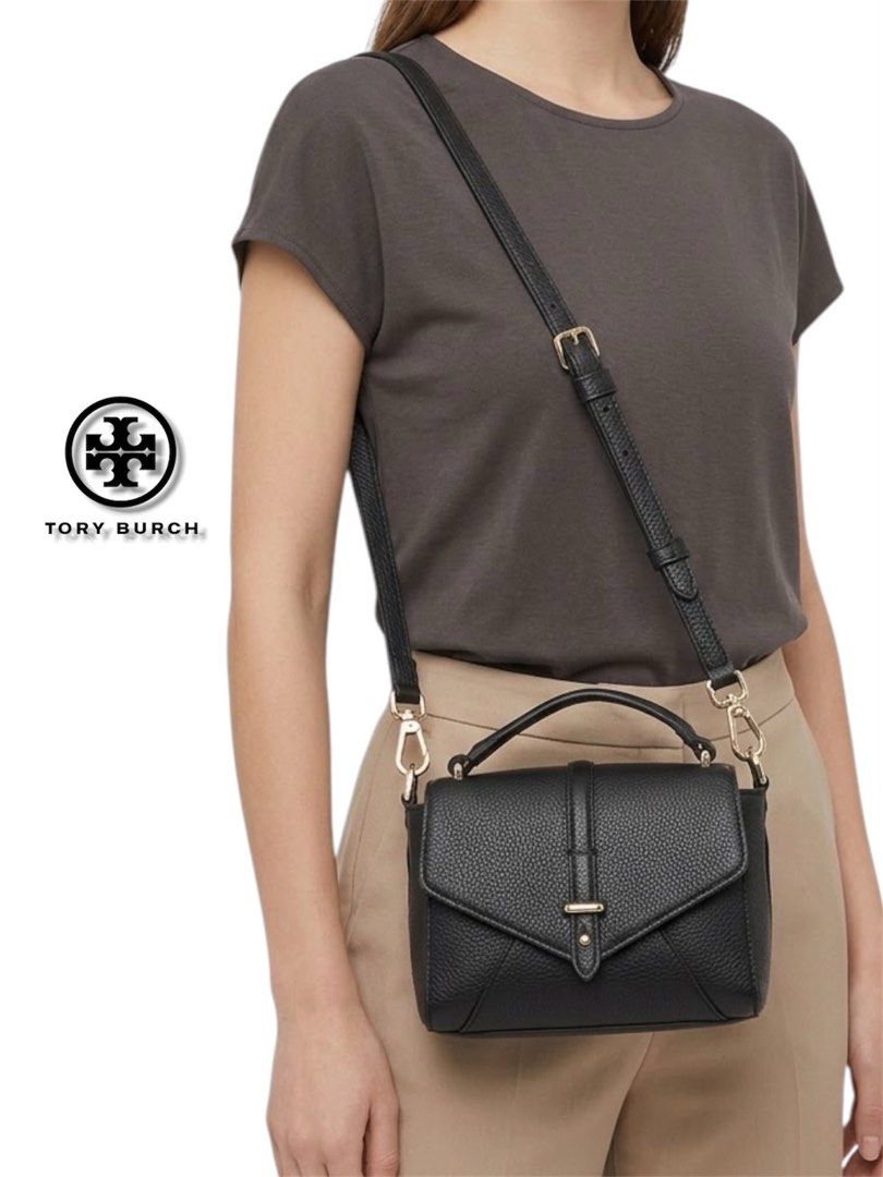 Tory Burch Black Leather Mini 797 Top Handle Bag (Category: Luxury Bags & Wallets) located in Cebu City. Submitted by gabgaaab (Listing ID 1458272437, Image 1). Description: - Tory Burch Black Leather Mini 797 Top Handle Bag - Excellent Condition - Color: Blackt - Material: Textured Leather - Style: Mini Bag - Features: Top handle, detachable crossbody strap - Hardware: Gold - Size: Compact, ideal for essentials - Versatility: Suitable for day or