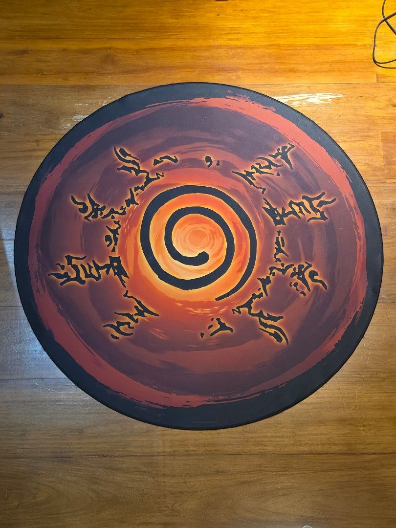 TTRacing Guardian Gaming Floor Pad - Naruto Edition (Category: Carpets, Mats & Flooring) located in Davao. Submitted by spotnick15 (Listing ID 1458200563, Image 1). Description: Selling My: TTRacing Guardian Gaming Floor Pad - Naruto Edition Shape: Round Size: 100cm x 100cm Thickness: 0.3CM (3MM) • Surface Material: Premium, water-resistant polyester fabric designed to resist spills and reduce noise from chair casters. • Base Material: Heavy-duty