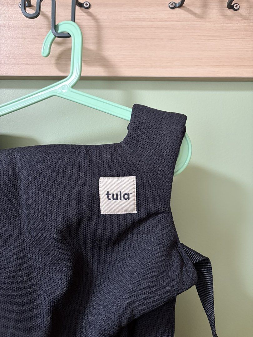 Tula Explore - Baby Carrier (Mesh Black) (Category: Carriers & Slings) located in Quezon City. Submitted by purpleranger (Listing ID 1458147412, Image 2). Description: - Black Tula baby carrier, bought in 2025 - Adjustable straps for a comfortable fit - Padded shoulder straps for extra comfort - Waist belt provides excellent support - Easy to buckle and unbuckle for quick use - Allows for hands-free carrying of your little one Lightly used - 2-3x