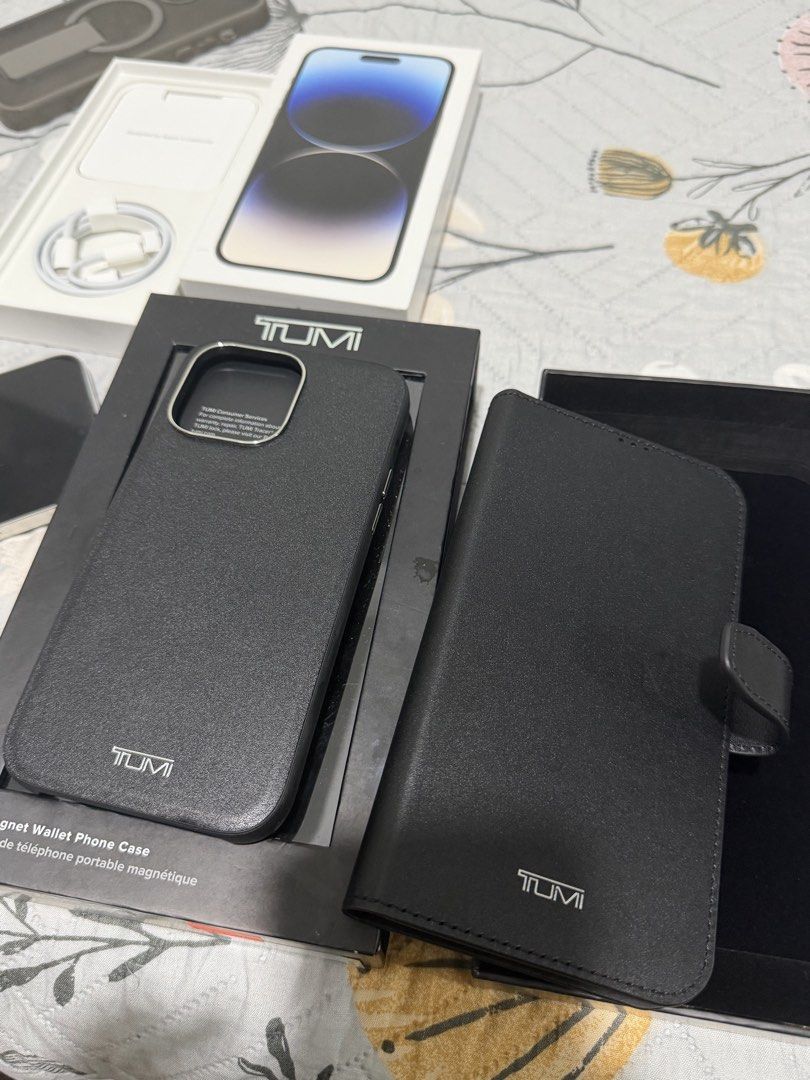 TUMI Magnet Leather Case for iPhone 14 Pro Max (Category: Cases & Sleeves) located in Makati City. Submitted by kiyashidi (Listing ID 1458250918, Image 2). Description: Selling original TUMI Magnet Leather Case for iPhone 14 Pro Max. * 💰 Price: ₱4,500 (slightly negotiable) * 🇺🇸 Bought from TUMI store in the US * 💵 Original SRP: $125 (₱7,700) * ✨ Used only twice, stored since * 📦 Complete inclusions * ✅ 100% Original & Authentic * 💯 Money ba