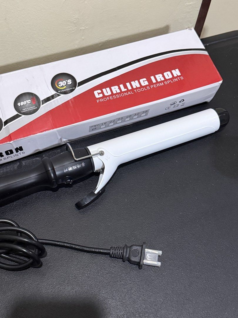 Ubeator Curling Iron Professional Tools Perm Splints (Category: Hair) located in Manila. Submitted by gooddealsmanila (Listing ID 1458280467, Image 1). Description: - Professional curling iron perfect for creating perm styles. - Rapid heating: Reaches 180°C in just 30 seconds. - Multiple barrel sizes available: 19mm, 22mm, 25mm, 28mm, 32mm, and 38mm to suit your styling needs. - Comes complete with a power cord for immediate use. - Ideal for achi