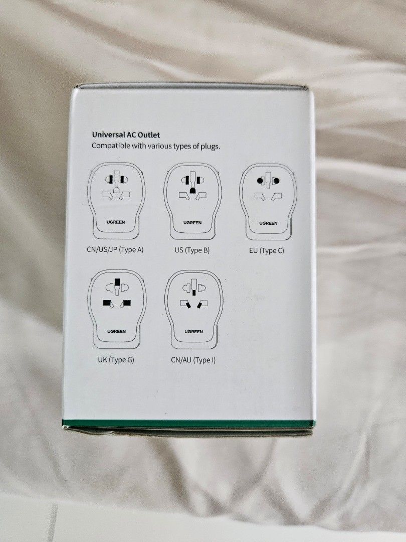 UGREEN 65W Universal Travel Adapter with USB-C (Category: Cables & Adaptors) located in San Juan City. Submitted by desdeclutters (Listing ID 1458111571, Image 2). Description: RFS: bought 2, I only need 1 - UGREEN 65W Universal Travel Adapter - Supports EU, US, UK, AU, CN plugs - 1 AC Outlet + 1 USB-C + 1 USB-A port - Ideal for laptops, tablets, and phones - Built-in 10A fuse for safety - Flame-retardant housing - GaNInfinity technology for effi