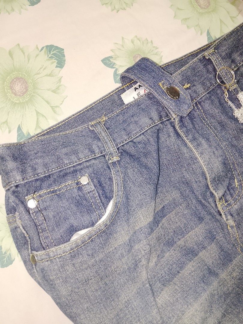 Upcycled Denim Jeans Shoulder Bag (Category: Shoulder Bags) located in Cabuyao City. Submitted by cozieee.eee (Listing ID 1458274225, Image 3). Description: - Made from actual denim jeans - Features original pockets and belt loops - Comes with a cute poodle charm - Adjustable strap for comfort - Ideal for casual wear - Unique and stylish piece.