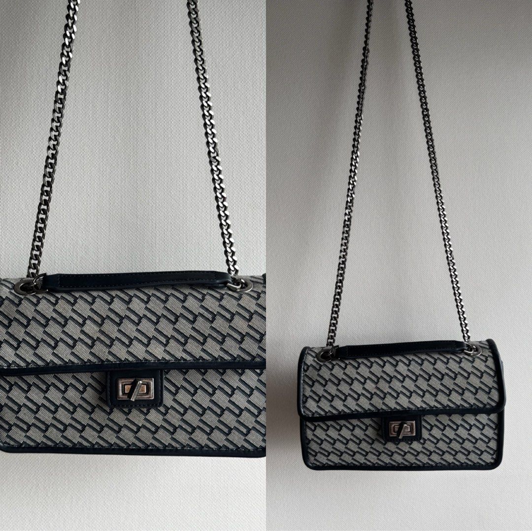 Urban Revivo Chain Shoulder Bag (Category: Cross-body Bags) located in Manila. Submitted by selyamaria (Listing ID 1458122103, Image 1). Description: - Stylish grey and black monogram shoulder bag - Features a sleek silver chain strap - Includes a comfortable black leather top handle - Secure front clasp closure - Versatile for everyday use or evening outings - Compact size, perfect for carrying essentials.