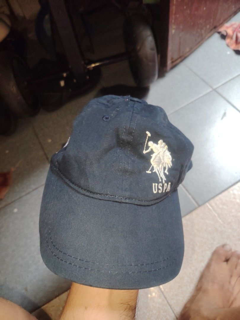 U.S. Polo Assn. Cap (Category: Caps & Hats) located in Pasig City. Submitted by michelle.asuki (Listing ID 1458157832, Image 1). Description: - Dark blue cap from U.S. Polo Assn. (Since 1890) - Features the classic polo player logo embroidered on the front - Adjustable strap at the back for a customized fit - Ideal for everyday casual wear - Simple, stylish, and versatile.