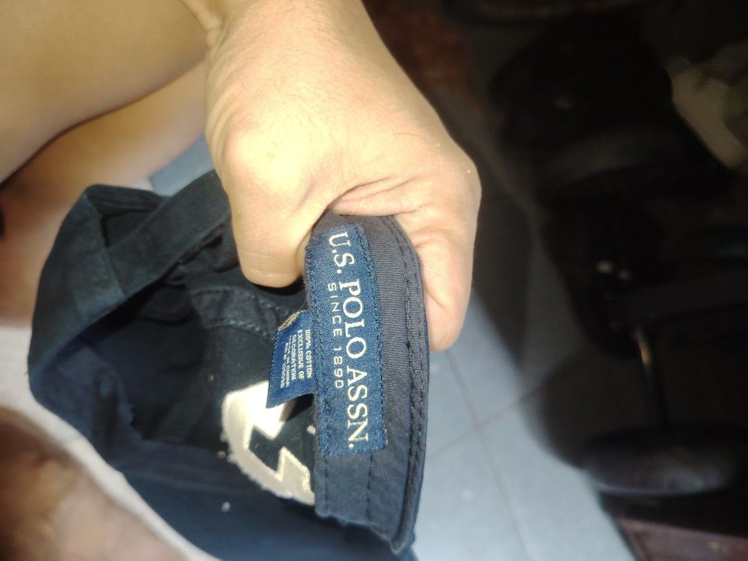 U.S. Polo Assn. Cap (Category: Caps & Hats) located in Pasig City. Submitted by michelle.asuki (Listing ID 1458157832, Image 2). Description: - Dark blue cap from U.S. Polo Assn. (Since 1890) - Features the classic polo player logo embroidered on the front - Adjustable strap at the back for a customized fit - Ideal for everyday casual wear - Simple, stylish, and versatile.
