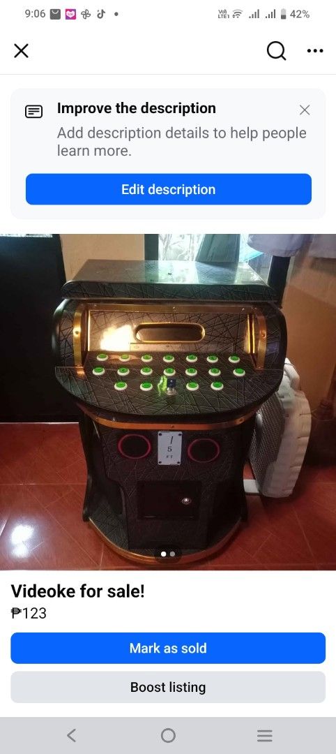 Videoke Machine with Speakers and Buttons (Category: Other Audio Equipment) located in Manila. Submitted by orly5.fire (Listing ID 1458200885, Image 2). Description: - Videoke machine for sale - Stylish black and gold design - Built-in speakers on the sides - Easy song selection with top buttons - Approximately 5 feet tall - Ideal for parties and gatherings.