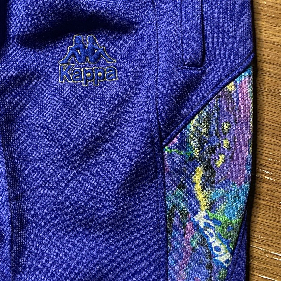 Vintage 90s Kappa Sport Abstract Pattern Panel Track Pants (Category: Joggers) located in Manaoag. Submitted by friends_7 (Listing ID 1458264773, Image 2). Description: Looking to upgrade your street-style wardrobe with a standout piece? Then you’re forgetting one thing, and that is not wearing aesthetic retro track pants. Have you imagined yourself looking effortlessly cool in vintage sportswear while others stick to basic joggers? Well, you can