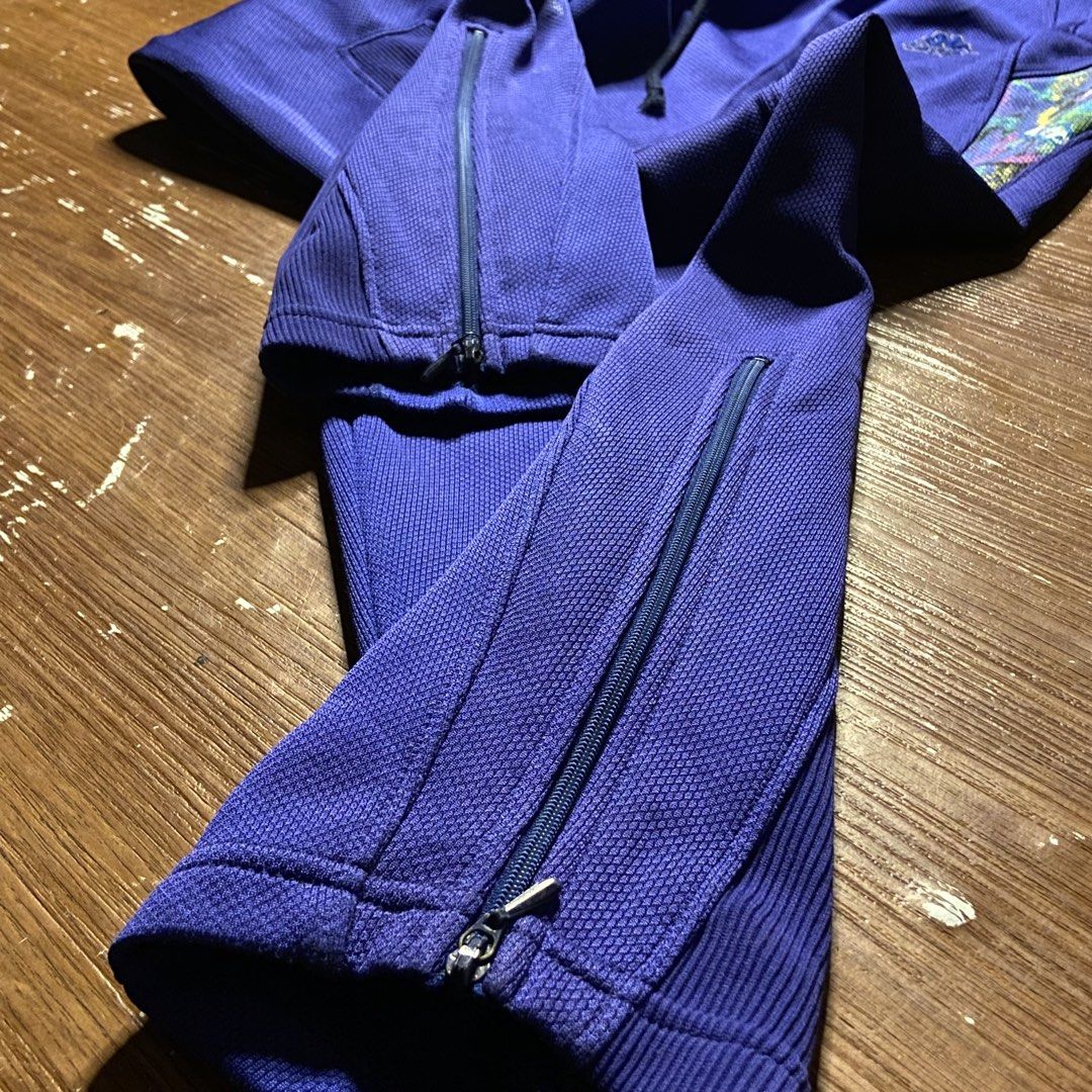 Vintage 90s Kappa Sport Abstract Pattern Panel Track Pants (Category: Joggers) located in Manaoag. Submitted by friends_7 (Listing ID 1458264773, Image 3). Description: Looking to upgrade your street-style wardrobe with a standout piece? Then you’re forgetting one thing, and that is not wearing aesthetic retro track pants. Have you imagined yourself looking effortlessly cool in vintage sportswear while others stick to basic joggers? Well, you can