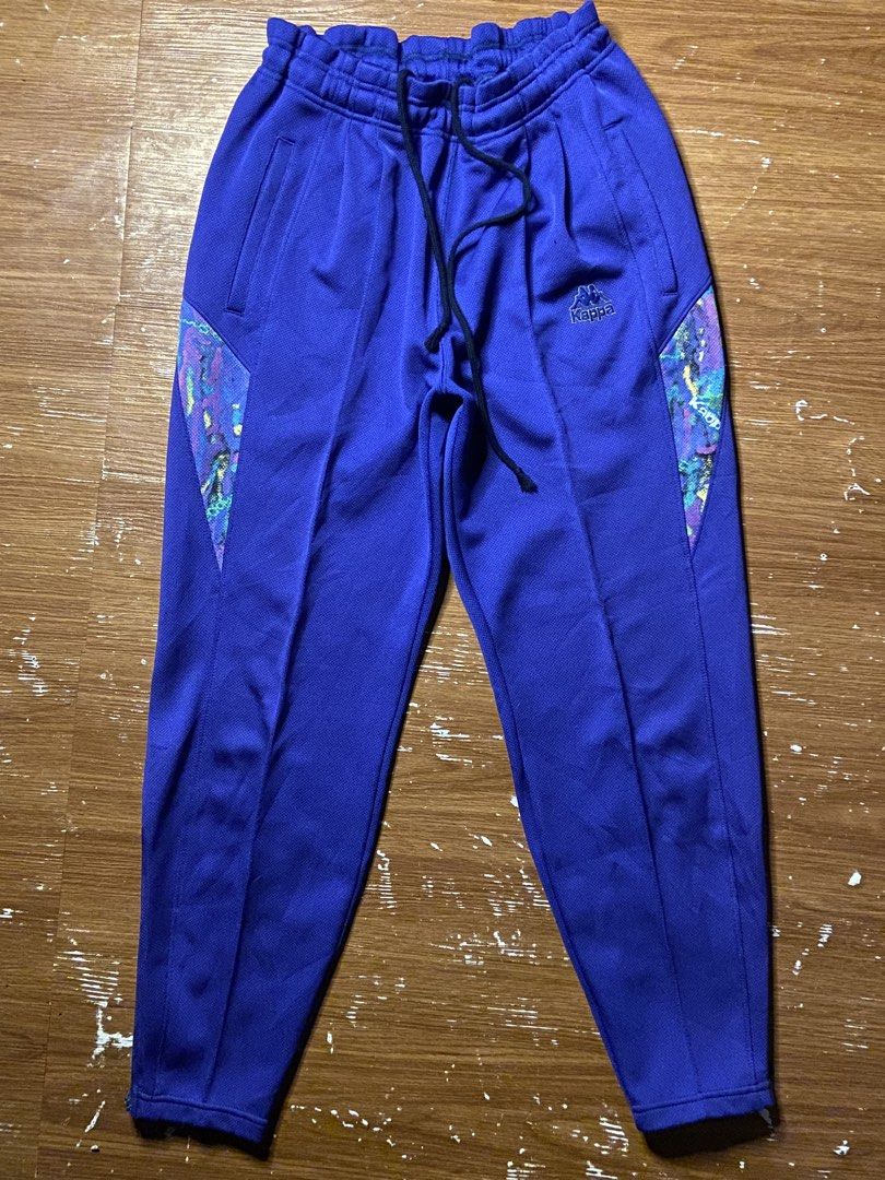Vintage 90s Kappa Sport Abstract Pattern Panel Track Pants (Category: Joggers) located in Manaoag. Submitted by friends_7 (Listing ID 1458264773, Image 1). Description: Looking to upgrade your street-style wardrobe with a standout piece? Then you’re forgetting one thing, and that is not wearing aesthetic retro track pants. Have you imagined yourself looking effortlessly cool in vintage sportswear while others stick to basic joggers? Well, you can