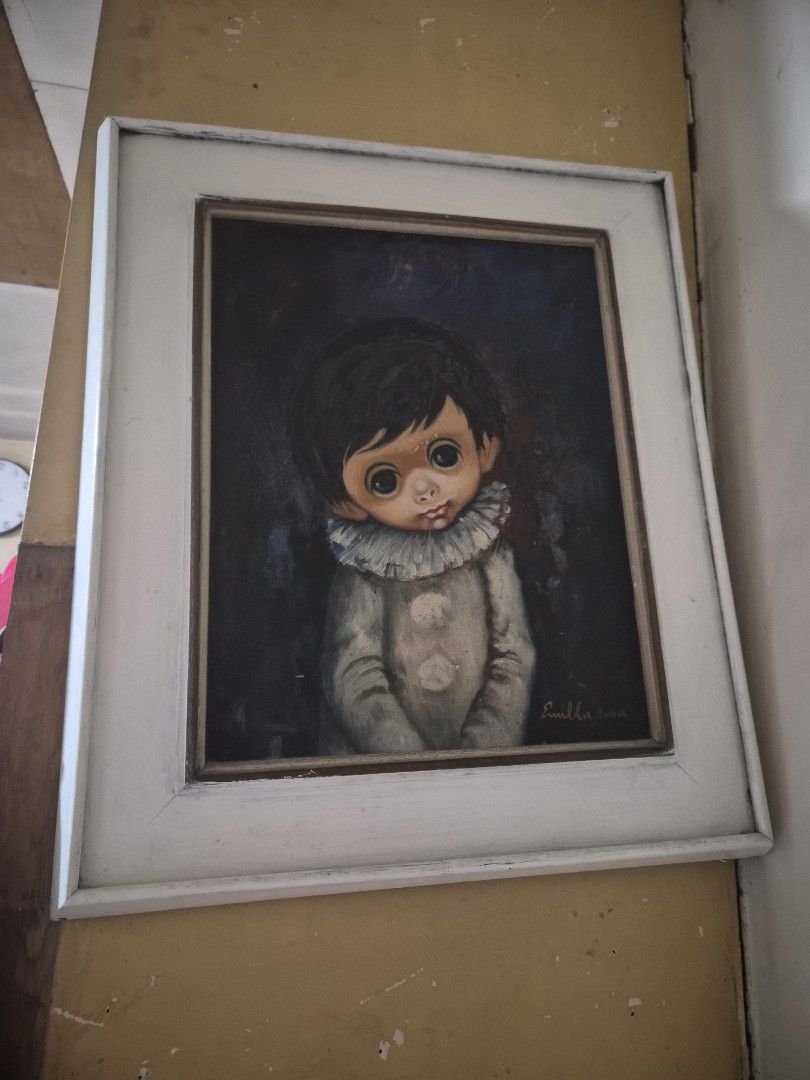 Vintage "Big Eyes" Painting - Signed (Category: Art & Prints) located in Marikina City. Submitted by jillianmendoza28 (Listing ID 1458294597, Image 1). Description: - Framed painting of a child with distinctive large eyes. - Artist signature on the right side. - Classic white frame. - Adds a unique touch to any room. - Ready to hang..